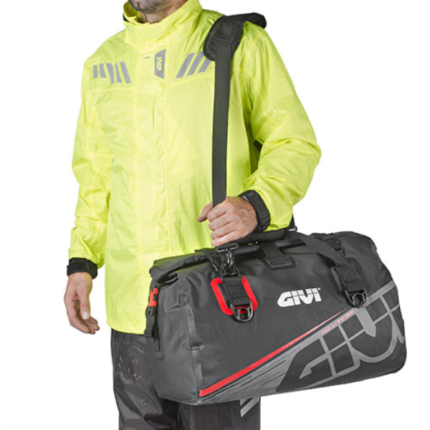 GIVI Tail Bag Waterproof 40L Grey Red worn on the shoulder